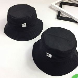 2 smiley bucket hats